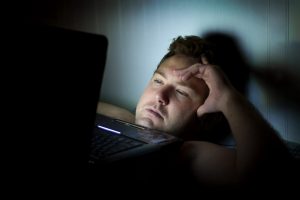 get more sleep by avoiding doing work in bed
